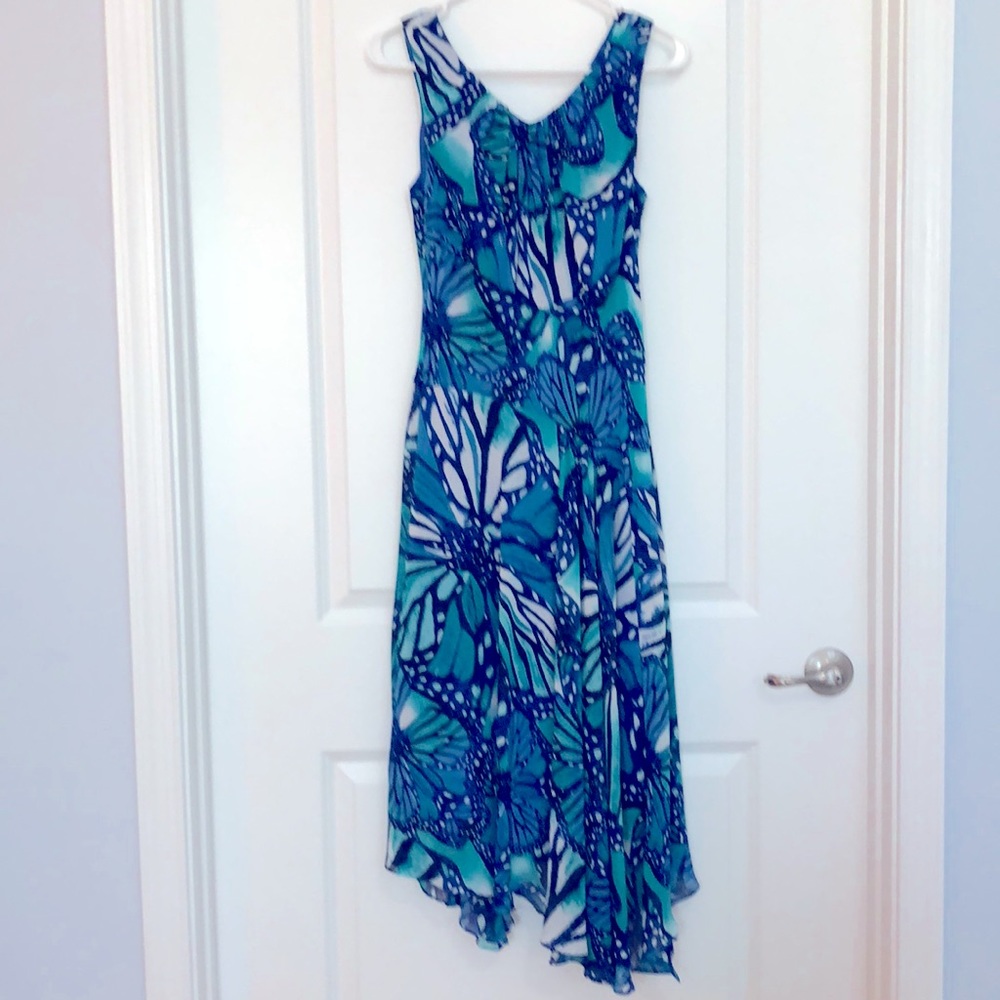 Fully lined high low dress. V shape back